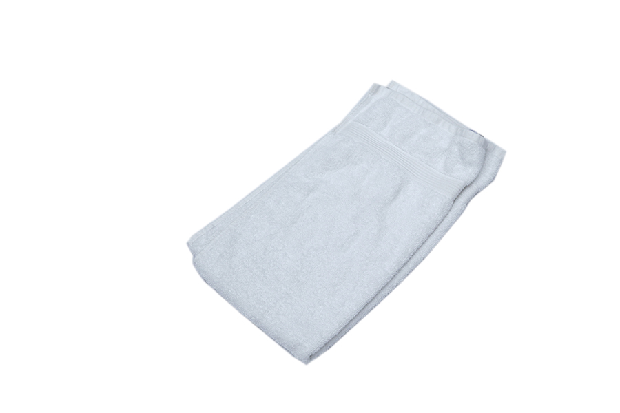 Eight shirts arranged on table in black, olive, grey, blue, white, red, mustard, and green.